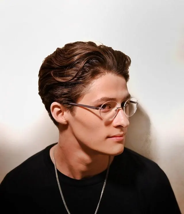 Mens haircut 2 featuring 90s waves on a guy in a black shirt with glasses