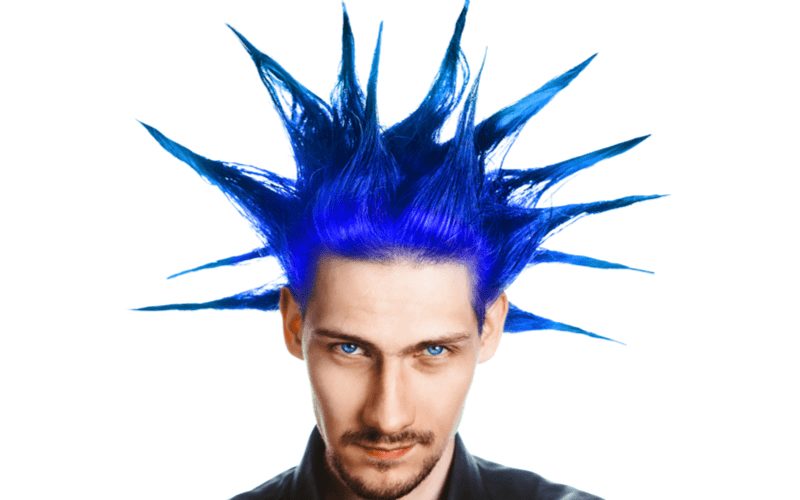 Man with extreme punk spikes that are blue and purple for a piece on bad haircuts