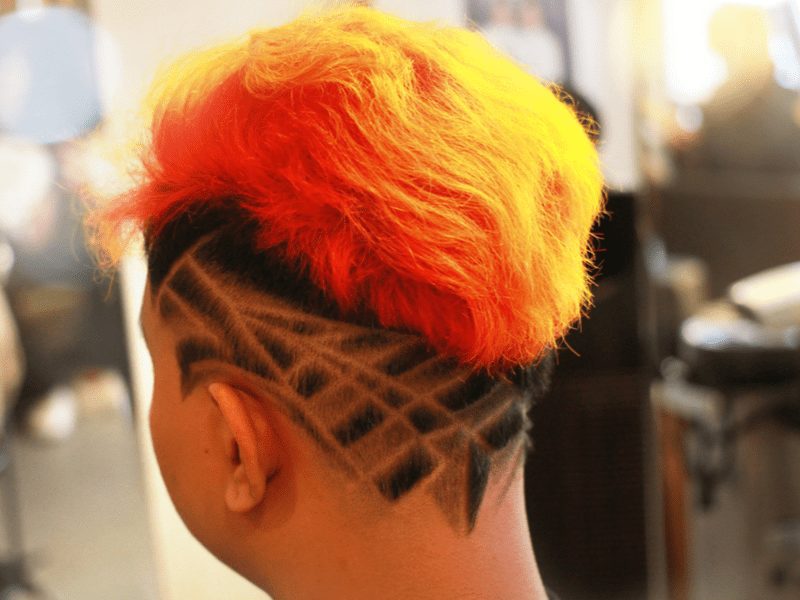 Shaved Pattern and Fluorescent Dye as a style inspiration for bad haircuts