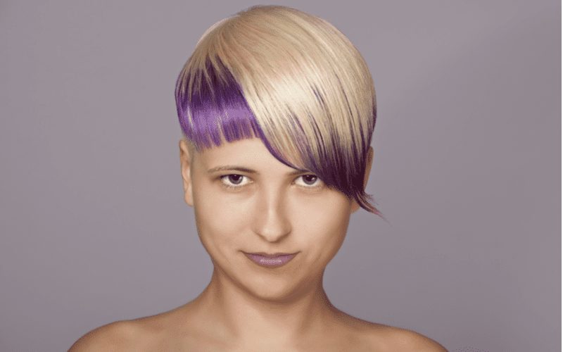Photo of a woman with a dyed pixie, also known as a bad haircut