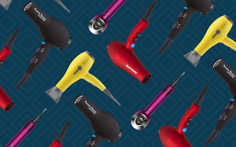 Best Hair Dryers laid out in a lay flat image against a patterned blue background