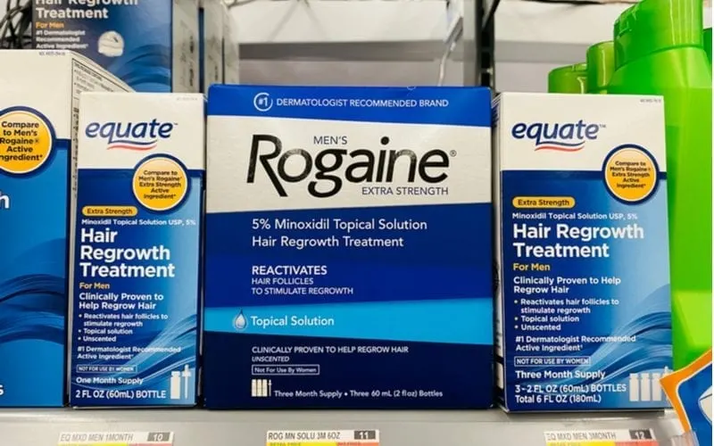 Image of various hair loss products available in an over-the-counter store