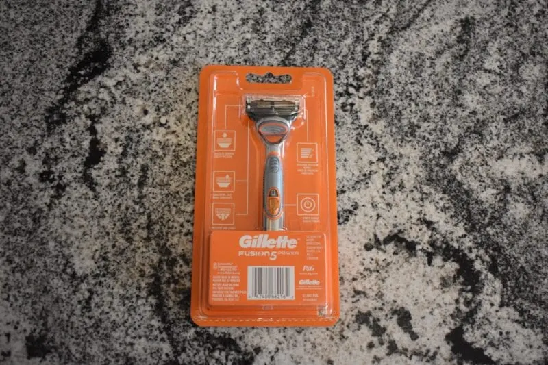 Best disposal head shaver, a Gillette Fusion 5 in its box sitting on a granite counter