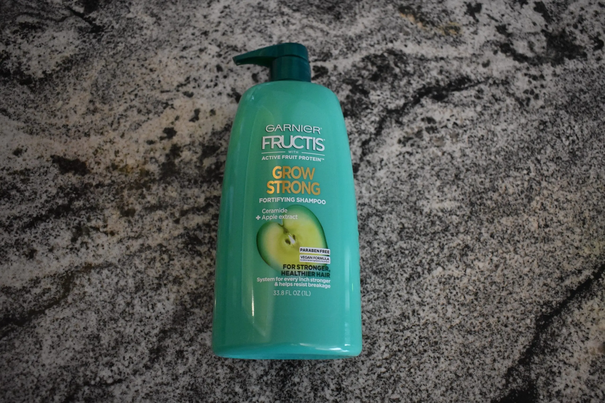Top pick for the best shampoo, garnier fructis shampoo sitting on the counter