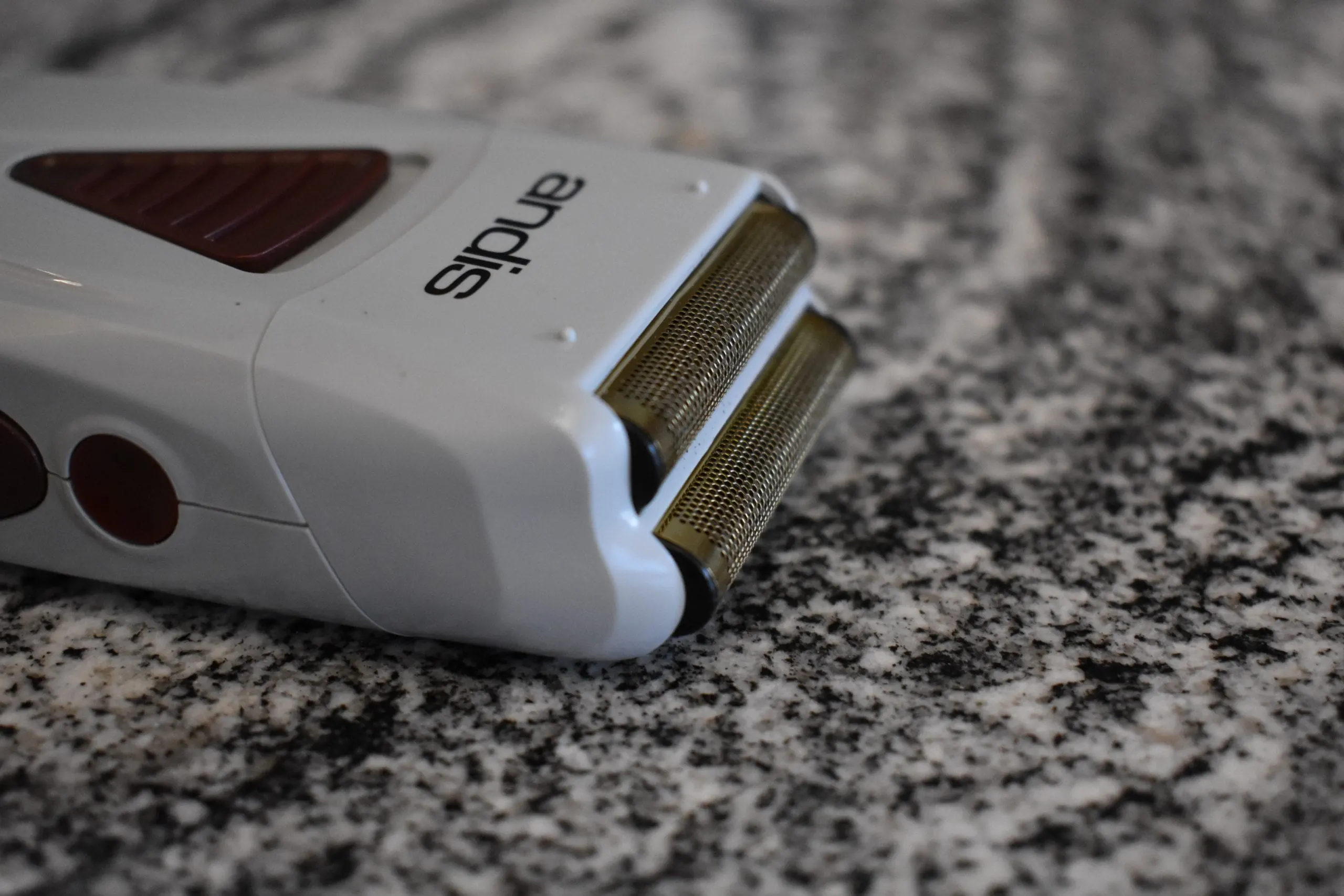 Side profile of one of the best head shavers, the Andis foil pro