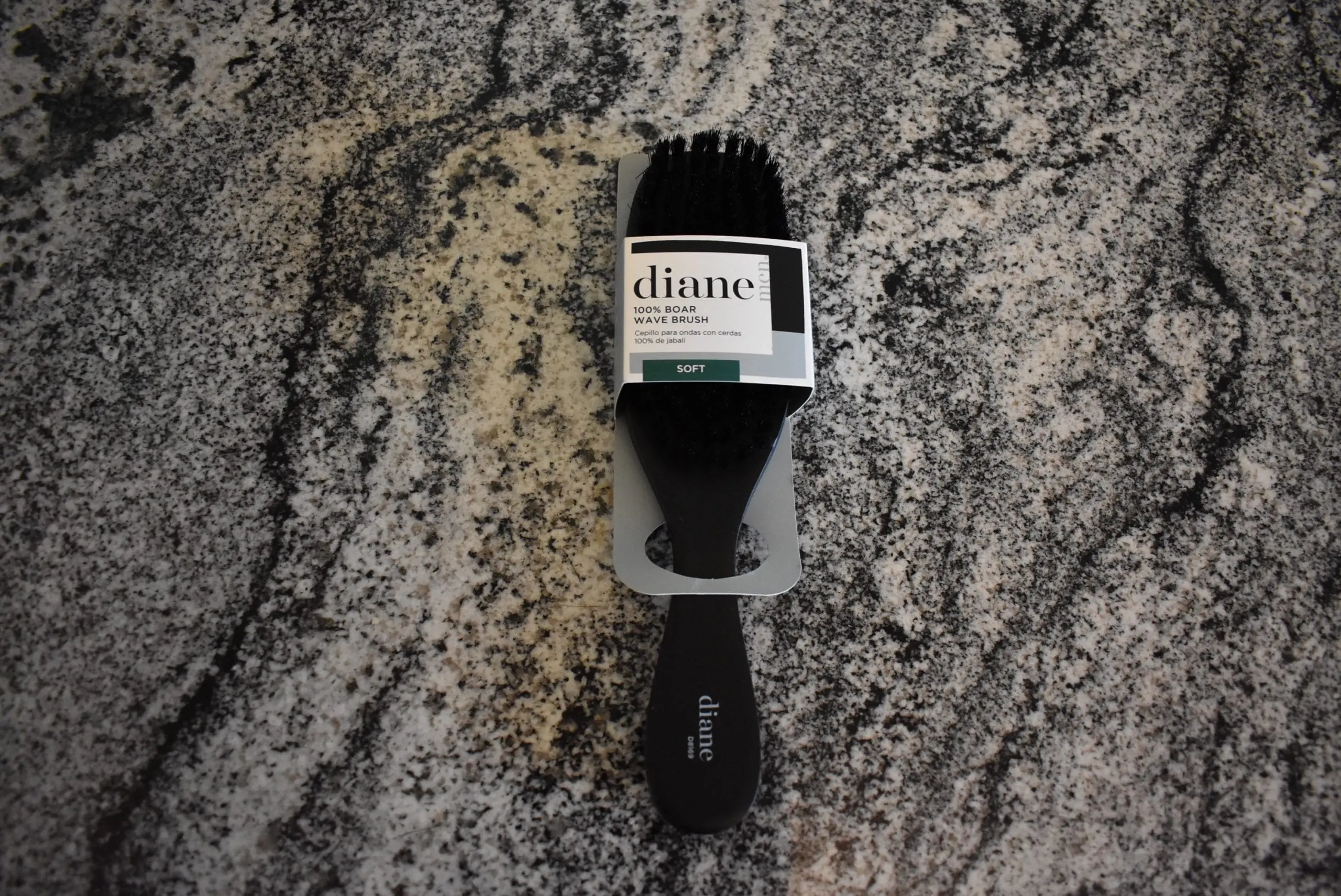 The diane boar brush (one of the best hair brushes) sitting on a counter before being unwrapped for a review