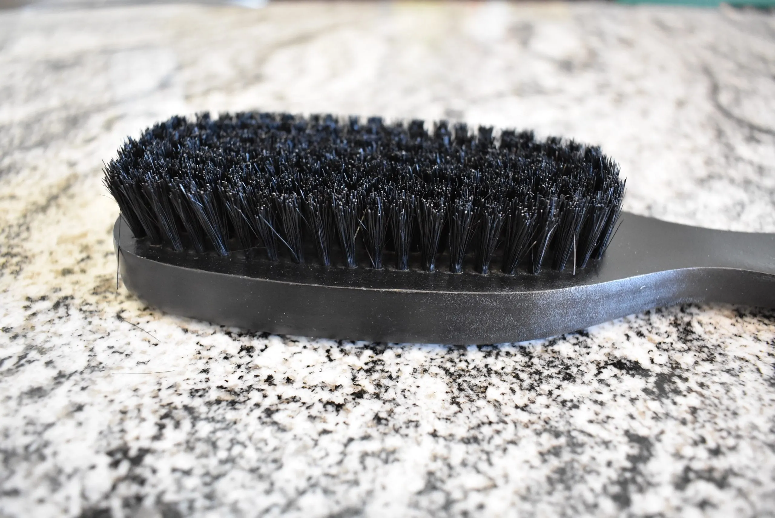 Close up of the Diane boar bristle brush on my counter