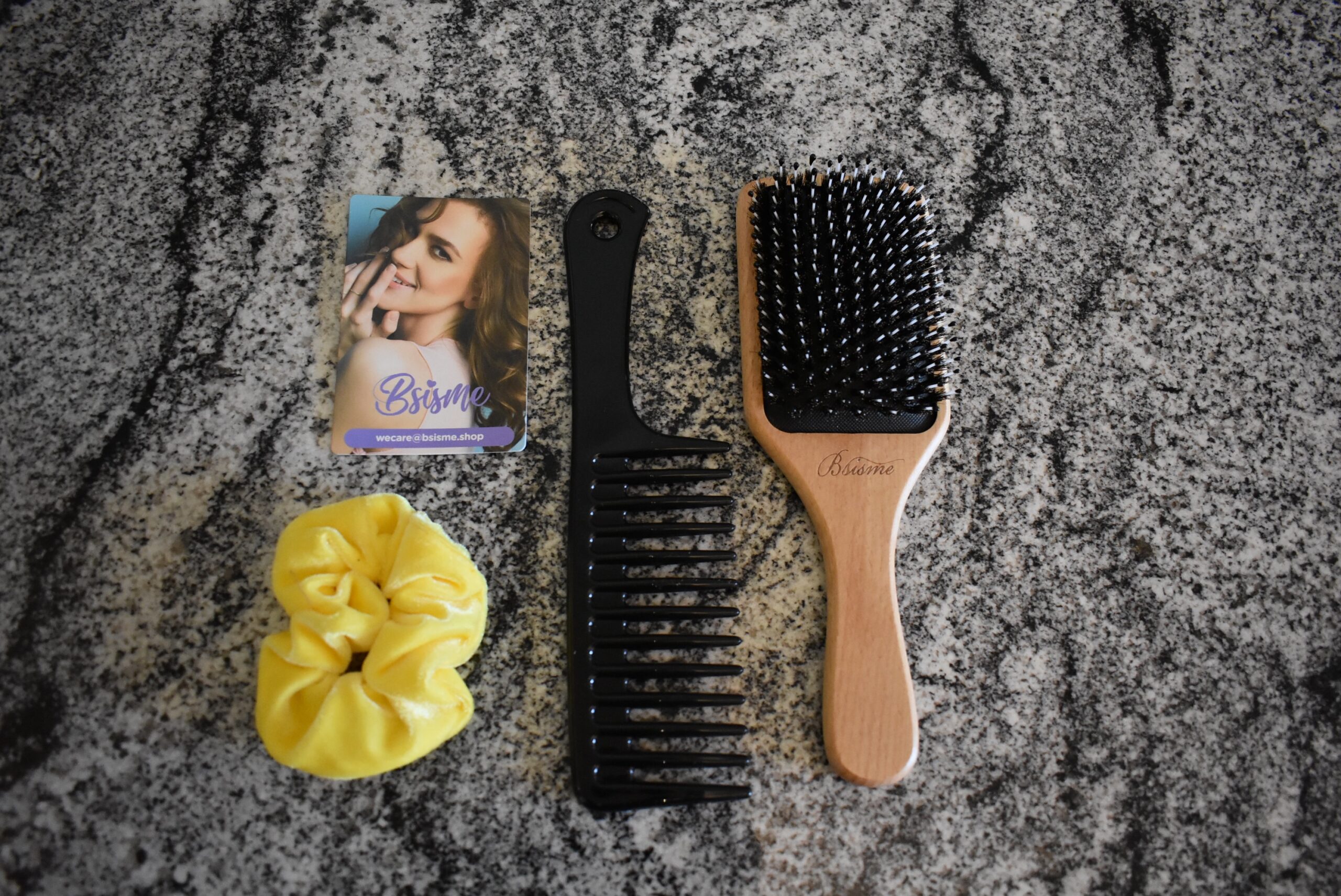 Everything the comes in the box of the Bsisme Boar Bristle and Nylon Paddle Hairbrush, the best hair brush for thick hair