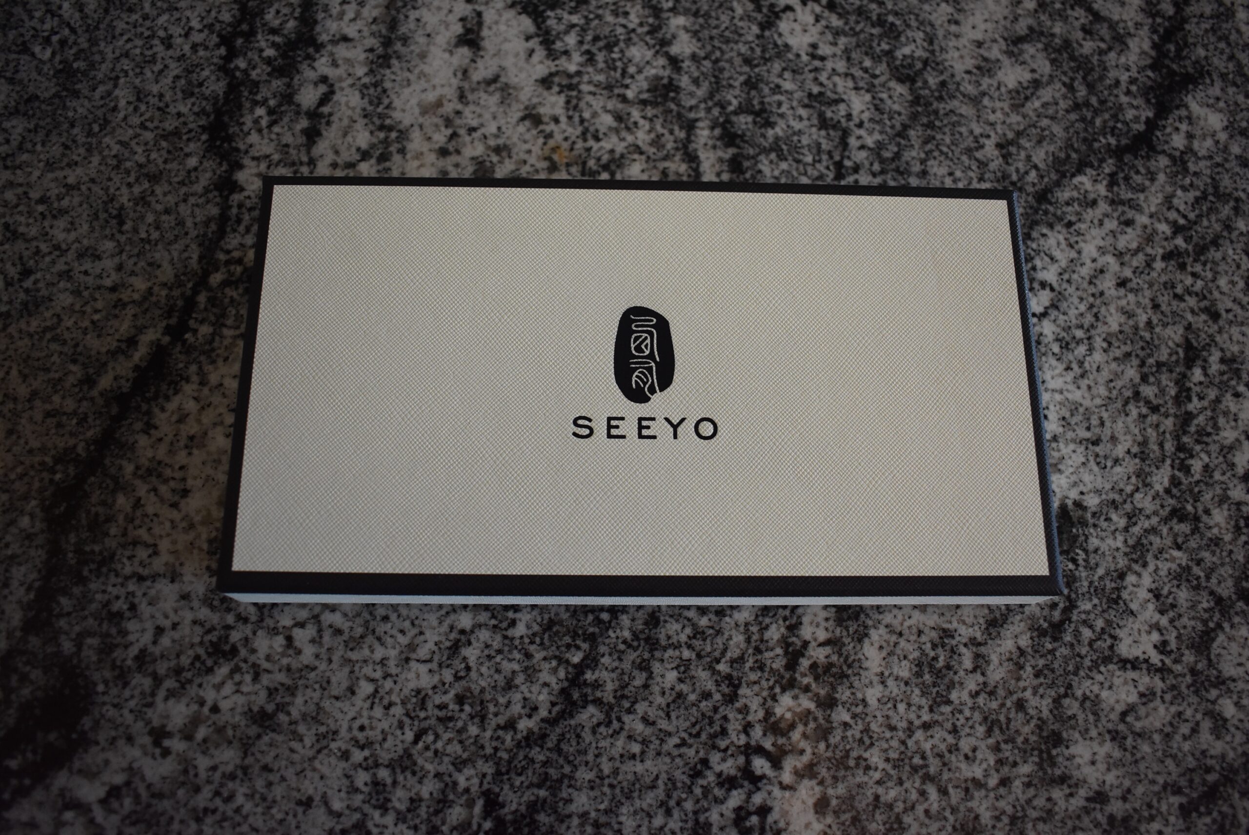 Seeyo straight razor (one of the best) in its box on a granite counter