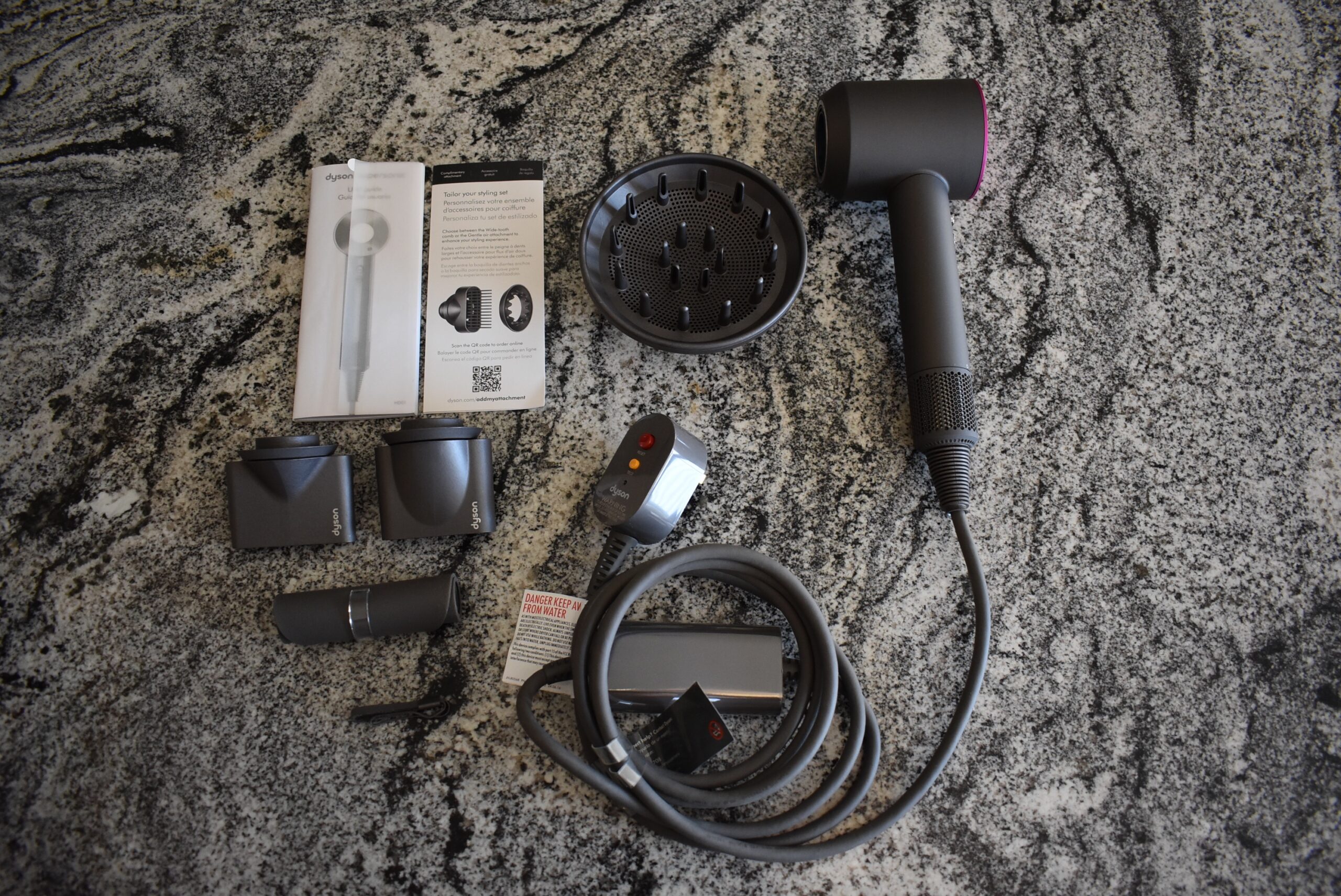 All of the Dyson hair dryer contents unpacked as part of a product review