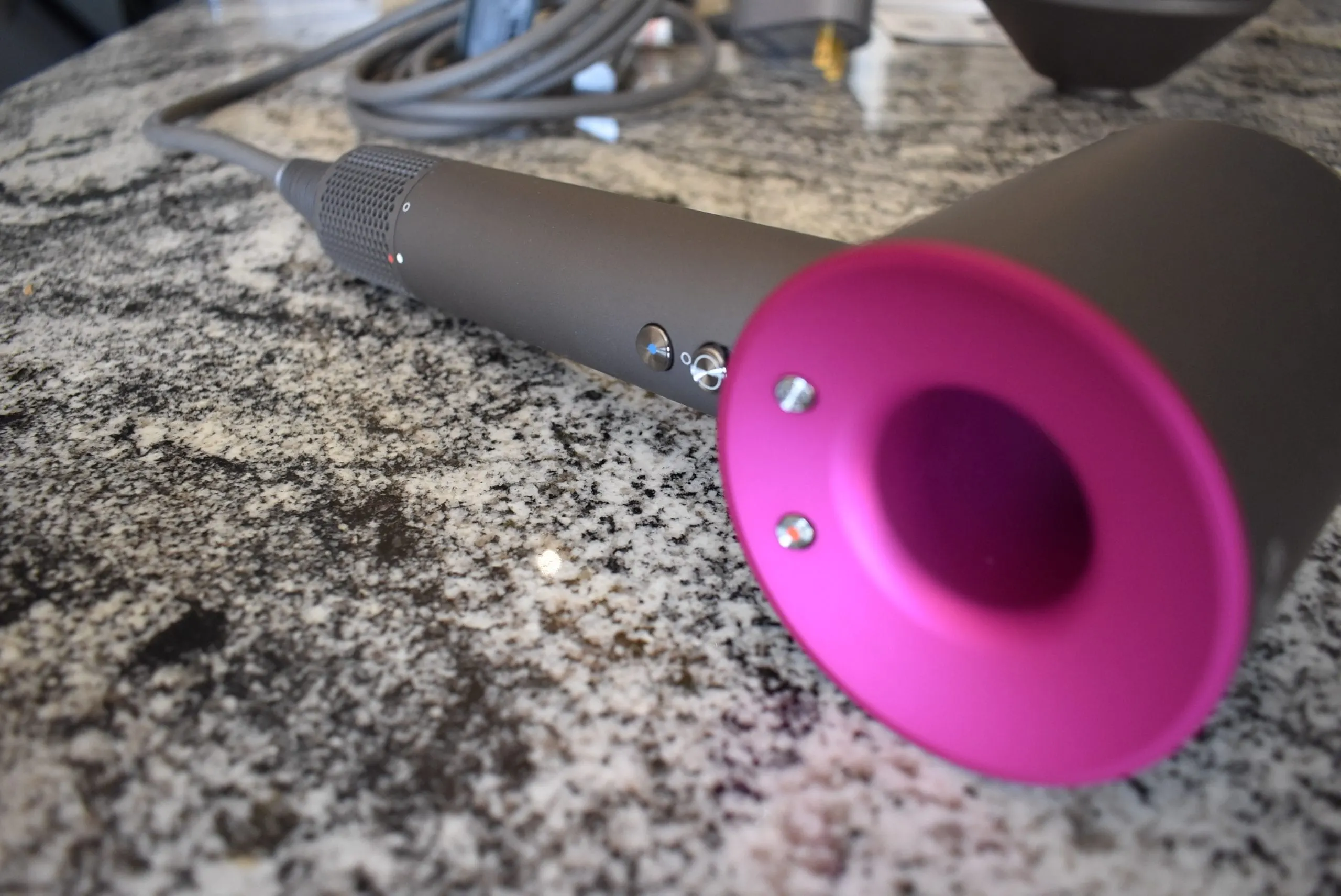 For a Dyson hair dryer review, the back and buttons of the unit