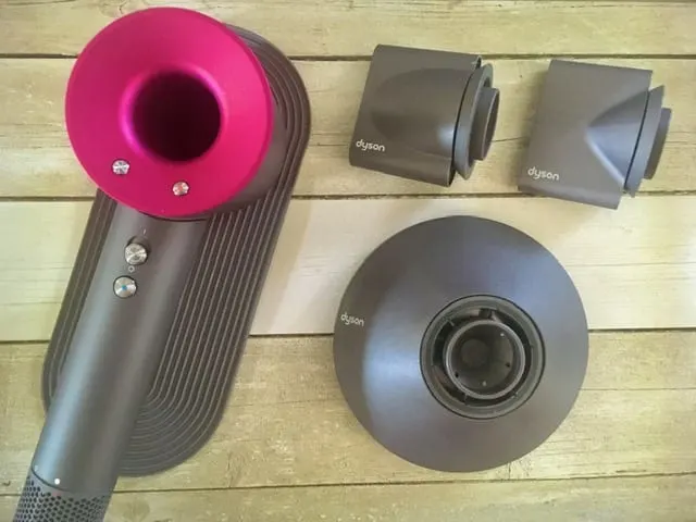 For a piece to answer is the dyson supersonic hair dryer worth the price, we bought the unit and laid the attachments out on a cutting board to review it