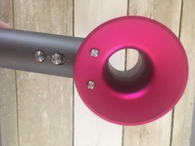 Up-close view of the Dyson hair dryer for a product review and test drive