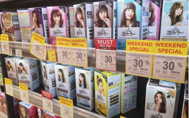 Lots of semi-permanent hair colors displayed on a shelf in Malaysia