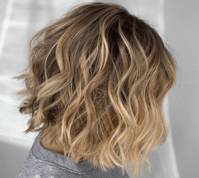 Example of short buttery blonde balayage highlights