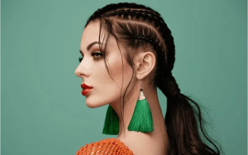 Woman with Cornrows Into Low Ponytail