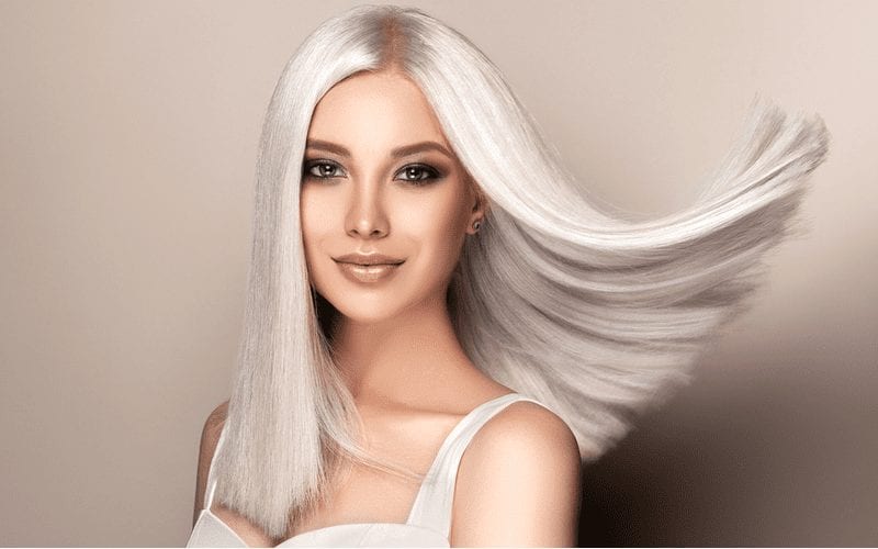 As an example of a long haircut inspiration piece, a woman with Platinum Point Cut