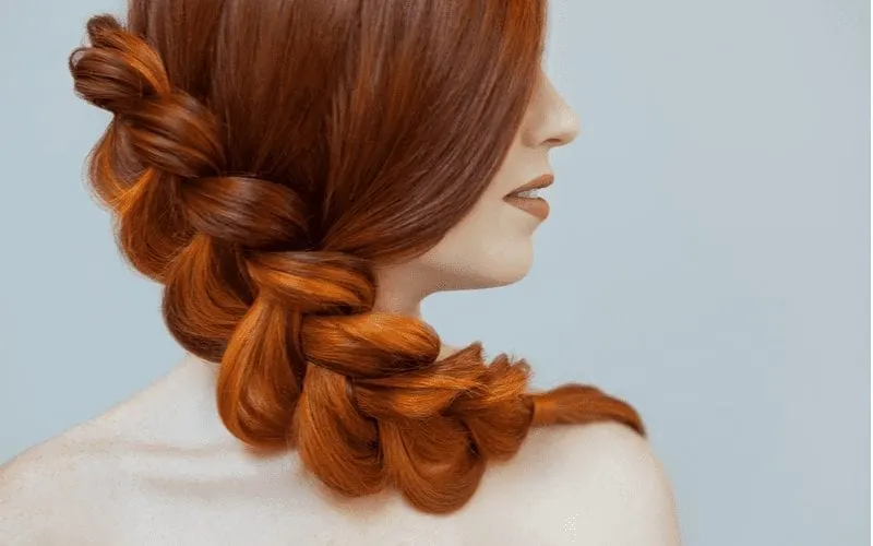 Diagonal Dutch Braid on a woman with red hair
