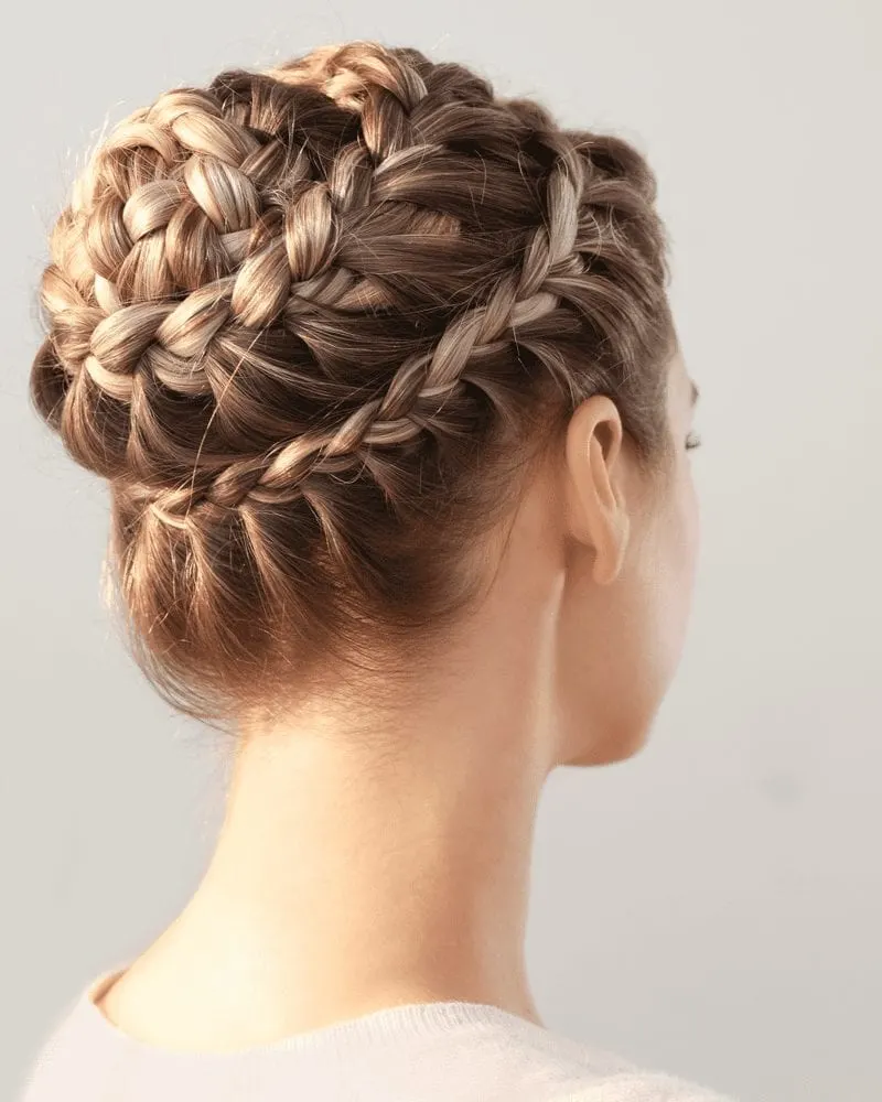 Spiral Crown Braid on a woman looking away from the camera