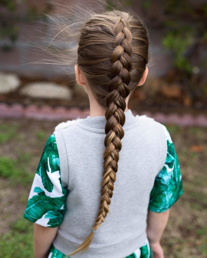 First toddlers braided hairstyle with a fishtail