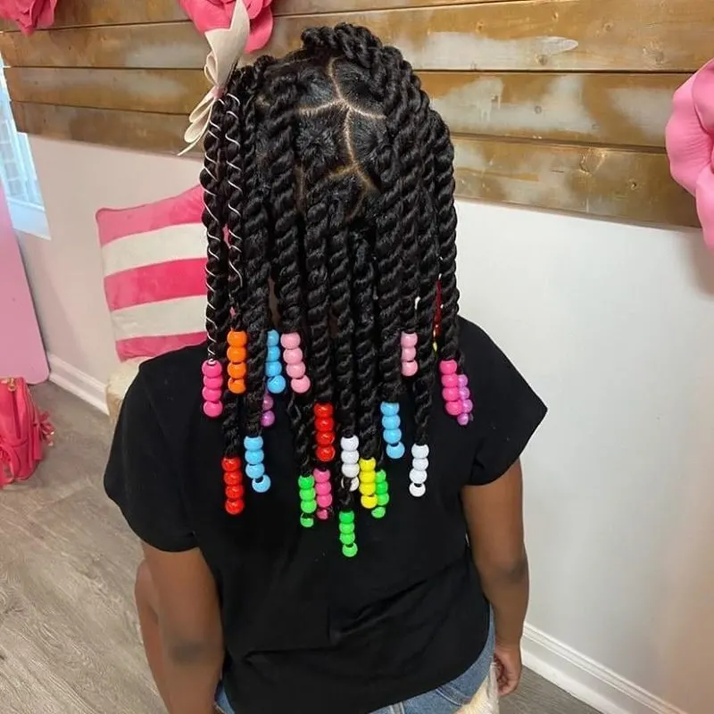 As a second example of a toddlers braided hairstyle, box braids on a young afro-american gal