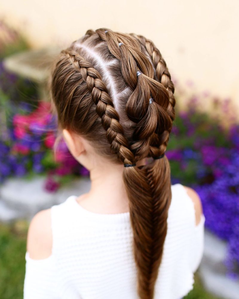 Triple combo braid example on a toddler in a white sweater
