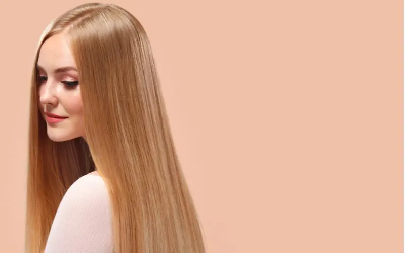 Pretty thin lady with straight hair as a result of a Keratin Treatment