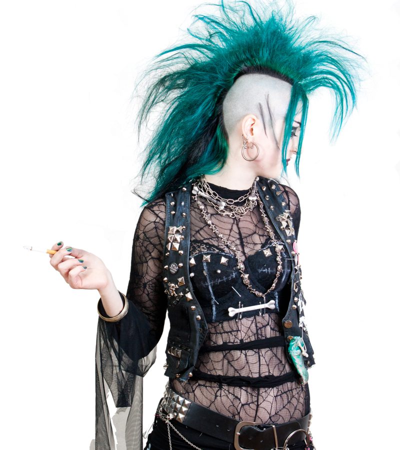 Ultra Long Deathhawk punk hairstyle worn by a woman in all black