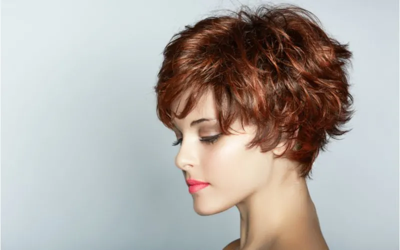 Short and messy feathered hair on a gal with a defined jawline