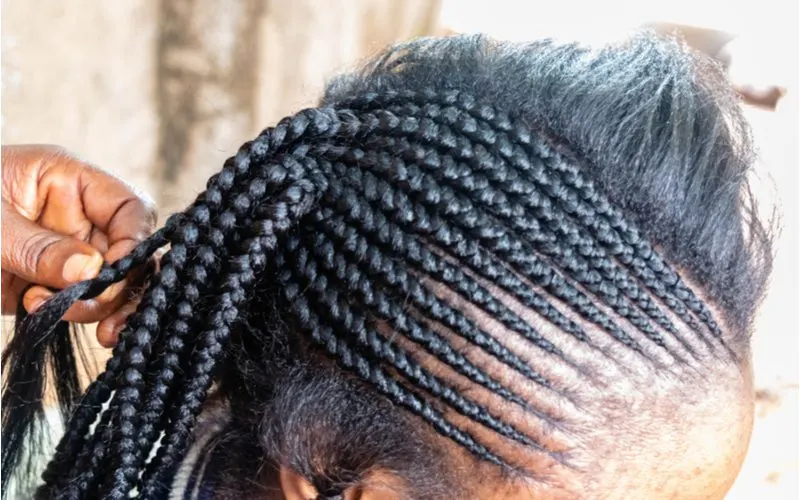 Close up of a Fulani Half-Hanging Tribal Braid hairstyle