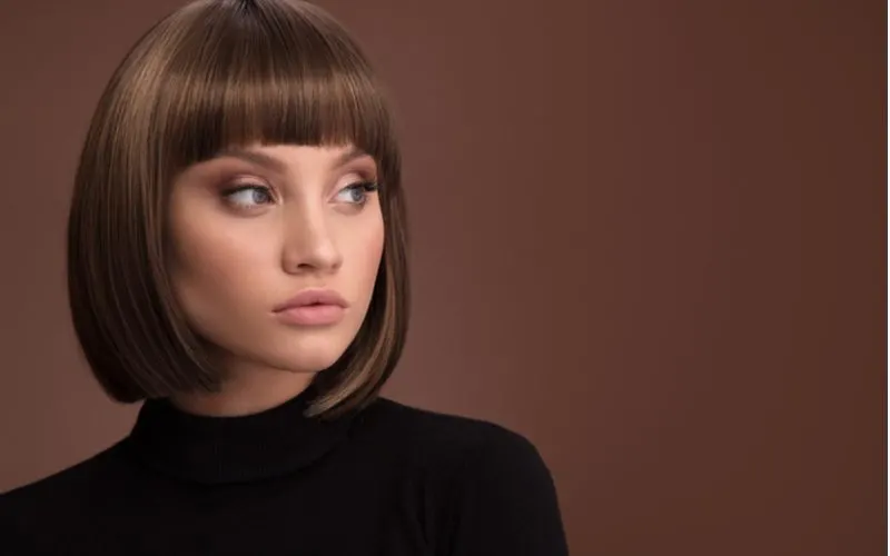 Balanced With Blunt Bangs for a piece on asymmetrical bob hair inspiration