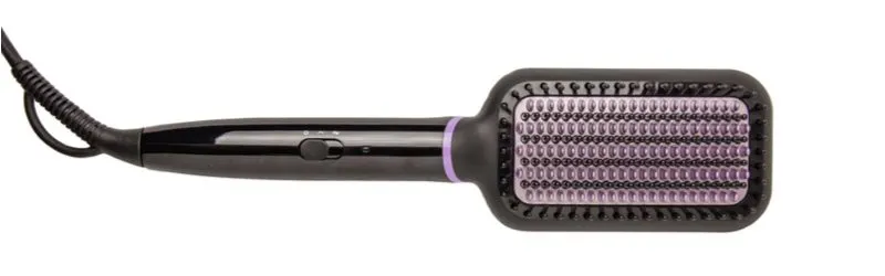 Close-up of a hot come, one of the best straightening products for black hair