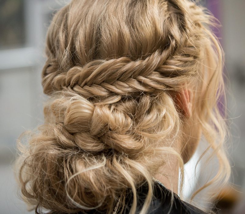 Classic braid and bun mother of the groom hairstyle
