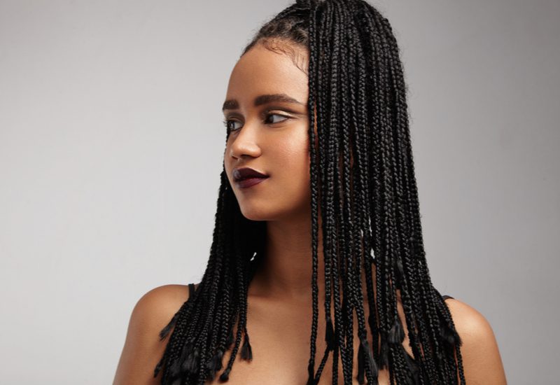 Gold Hardware and Red Tipped Box Braids