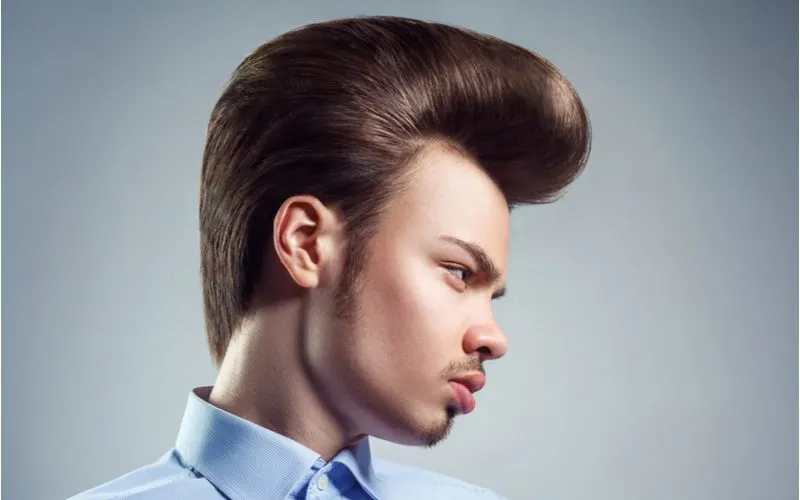 Perfectly Coiffed Pompadour on a guy in a blue button-up shirt