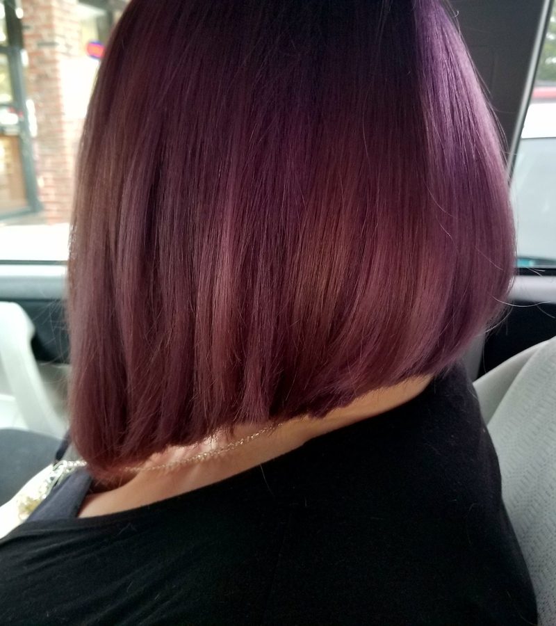 Inverted Mulberry Bob on a woman in a car