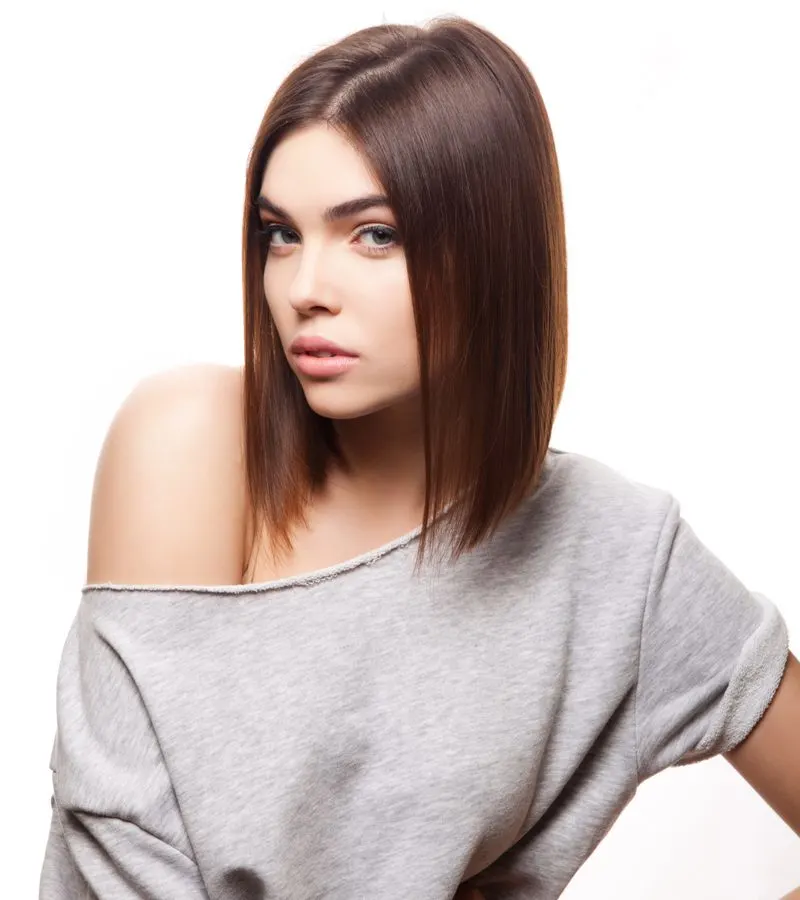 Subtly Soft Ends on a woman with a collarless shirt