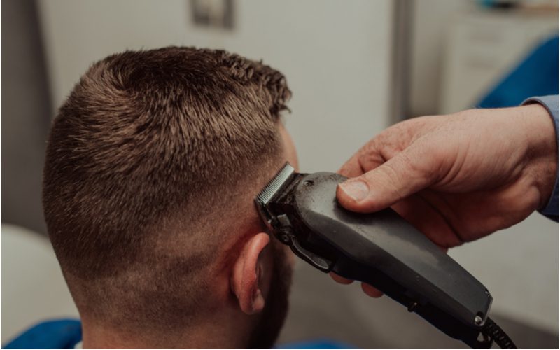 3-2-1 Mid Drop Fade being cut by a barber with electronic shears