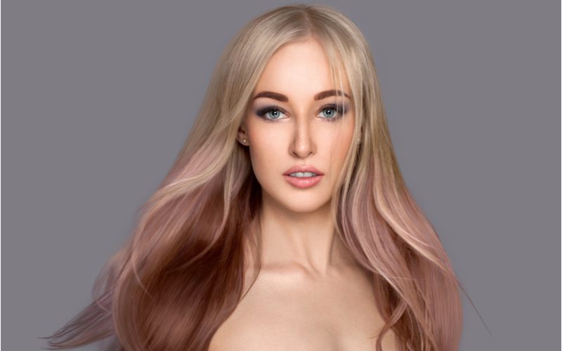 For an idea for underdye hair, a woman with Rosy Platinum Over Auburn Hair