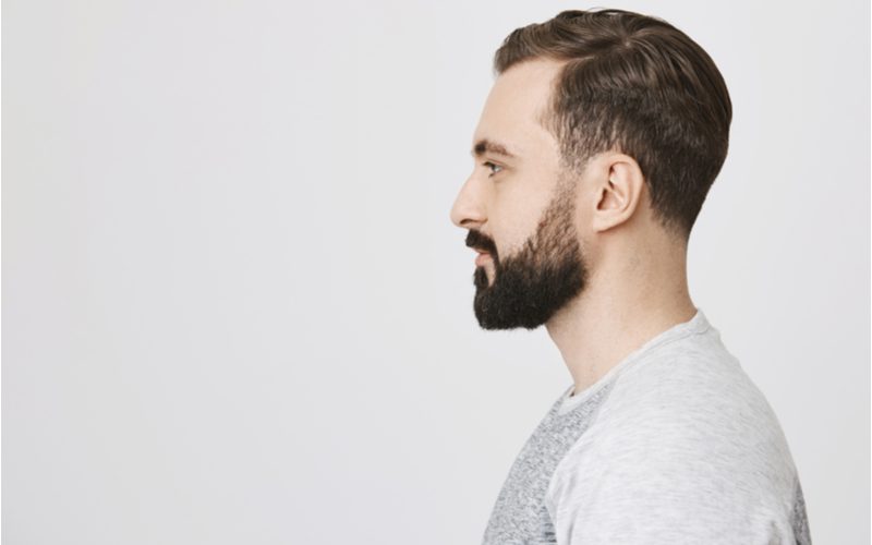 Men's haircut with beard idea featuring a Casual Comb Over Fade & Fade-In Beard
