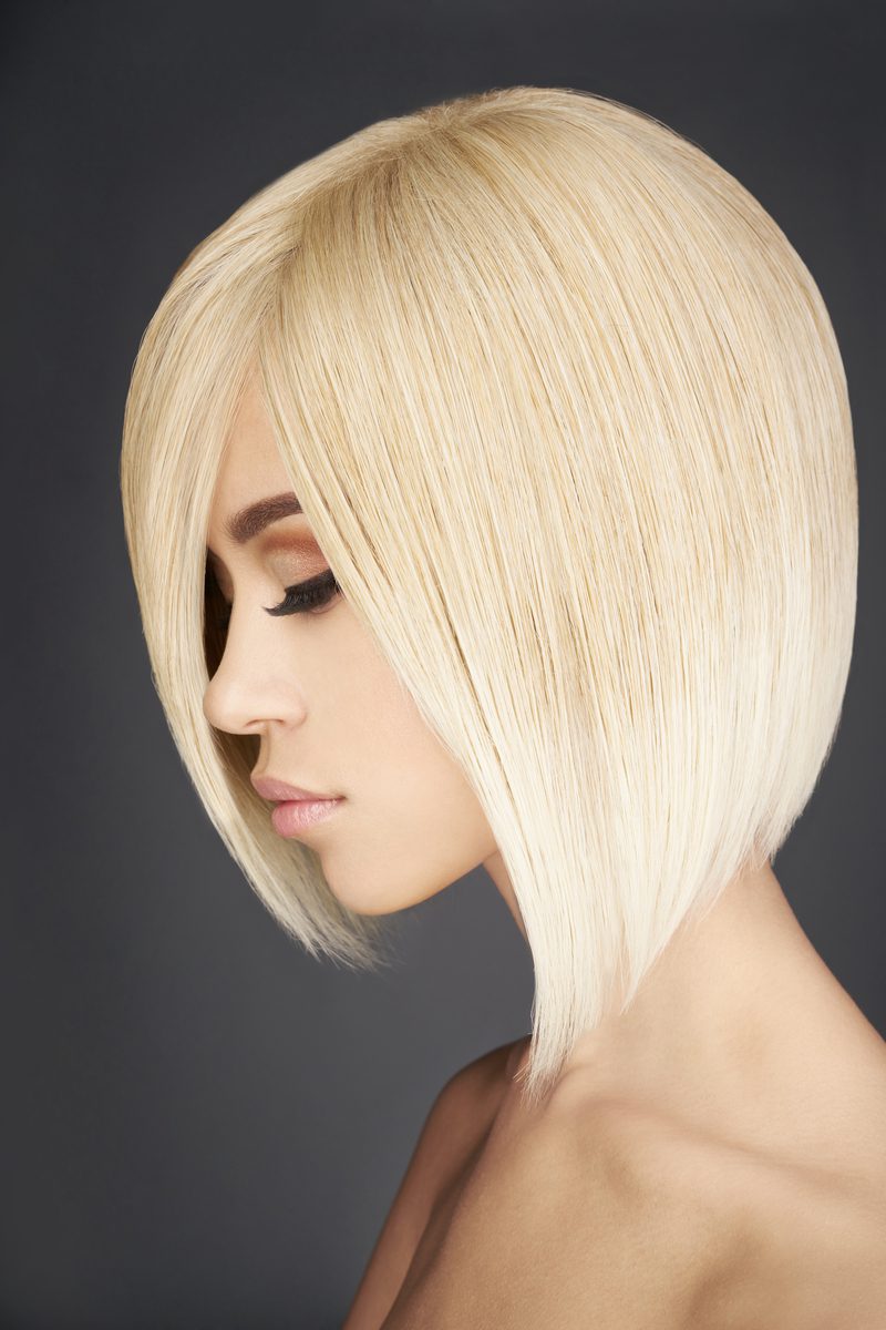 A great haircut for round faces women, a Sleek Inverted Bob With Side Part