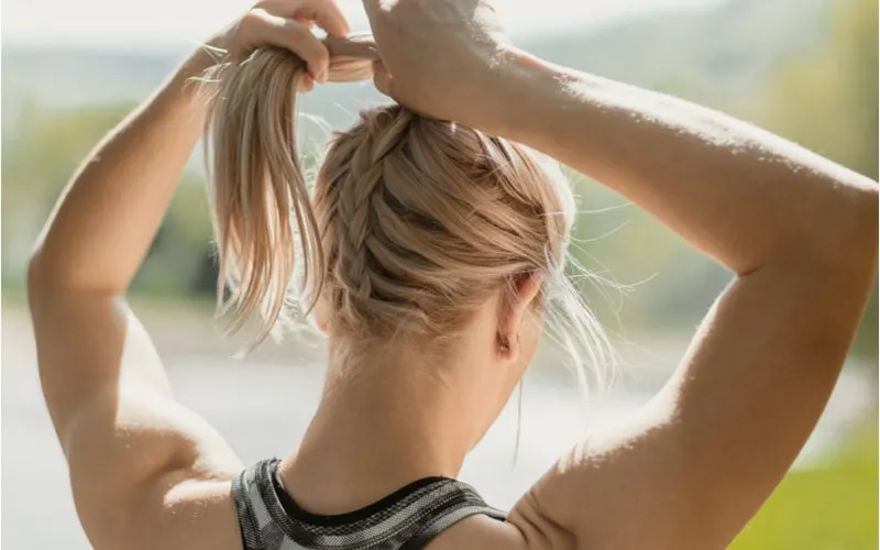 Under-Braided Ponytail for an idea of long to medium length hairstyles on a sporty blonde woman