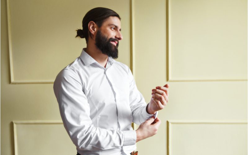 Low Polished Man Bun With Garibaldi Beard