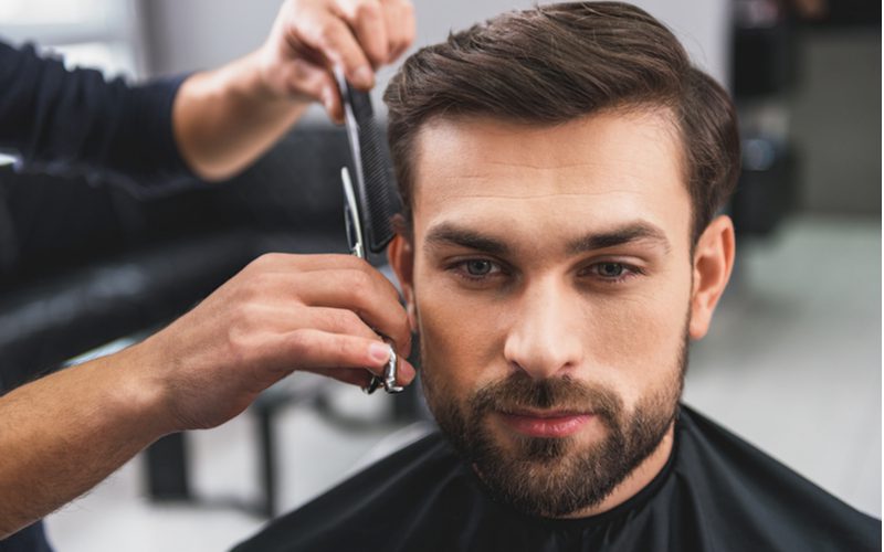 One of the best haircuts for receding hairlines, a Long Top Taper With Side Part