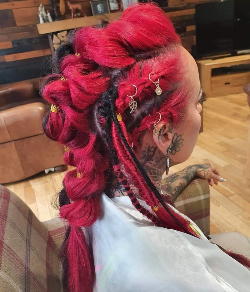Neon red and black Viking hairstyle