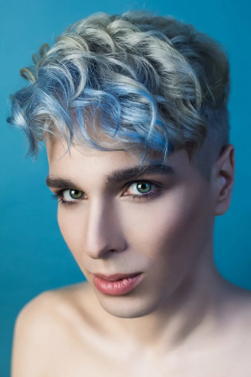 Two Block Cut With Icy Blue Curls for a piece on Androgynous haircuts