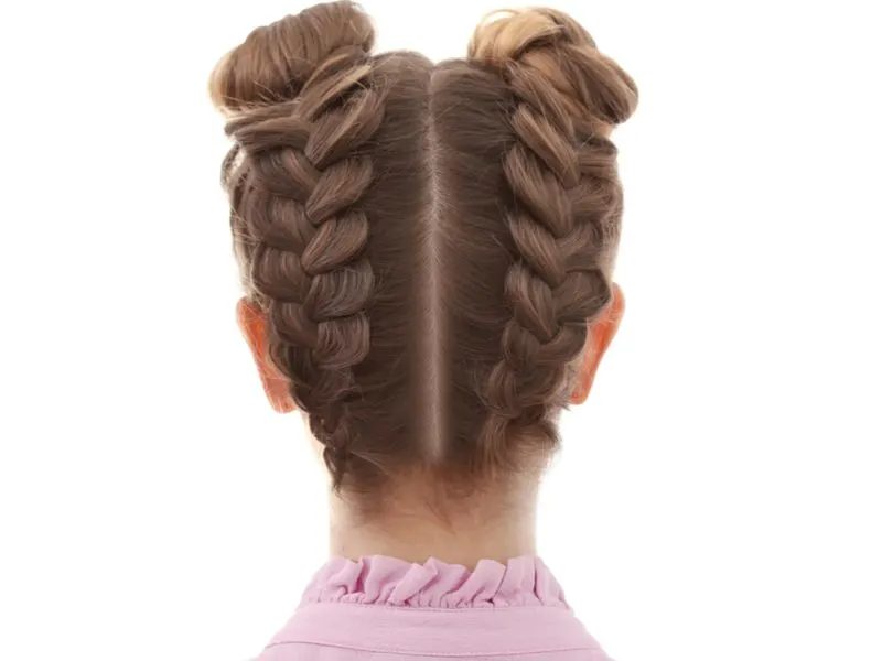 Dutch Braided Space Buns pictured as a style guide on how to wear a French Braid
