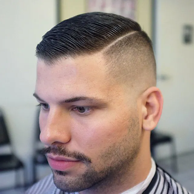 High and tight with side part haircut