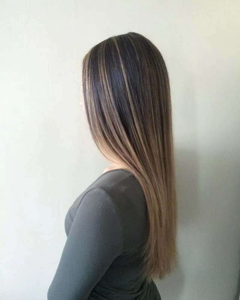 Long Fade Brown hair with blonde highlights