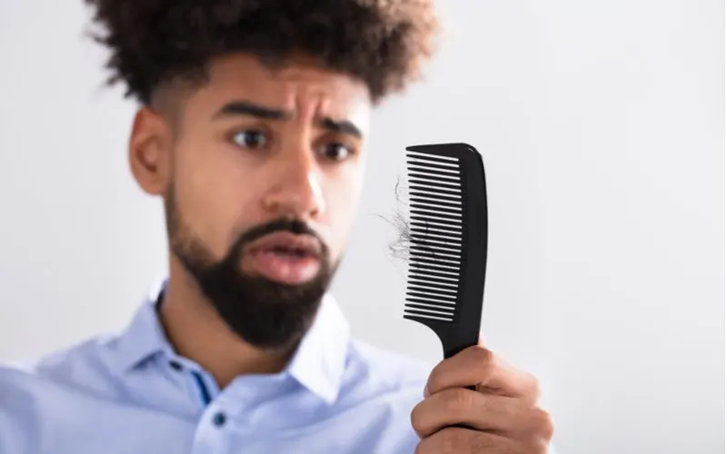 Guy who needs the best hair gel for black hair